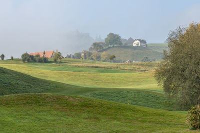 Scenic view of field against sky in switzerland