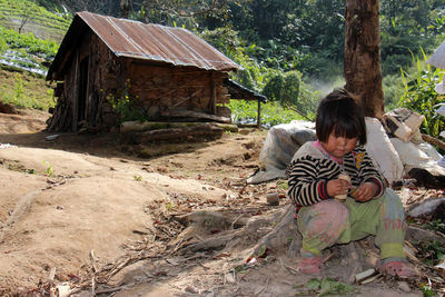 Rear view of girl on land