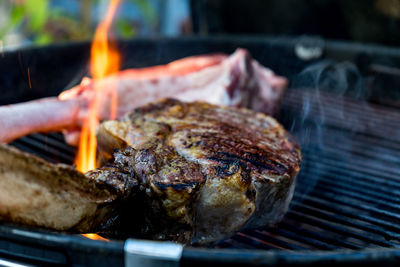 Close-up of meat on barbecue grill