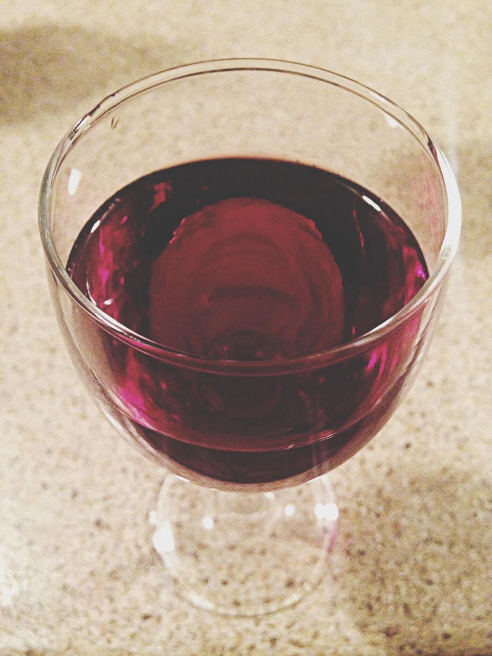 drink, refreshment, food and drink, drinking glass, freshness, indoors, table, glass - material, close-up, still life, red, transparent, glass, high angle view, pink color, reflection, wineglass, water, no people, alcohol