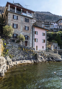 Buildings by river