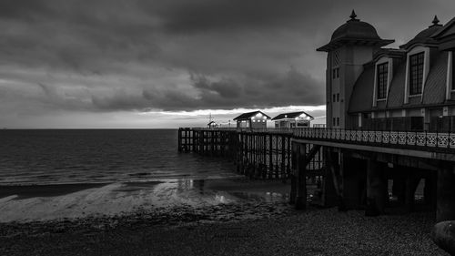 Pier over sea against sky