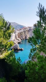 Scenic view of landscape against clear blue sky