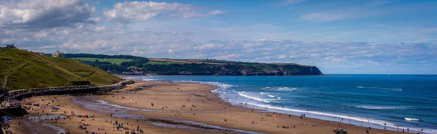 Panoramic view of beach against sky