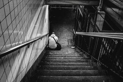 Man sitting on stairs