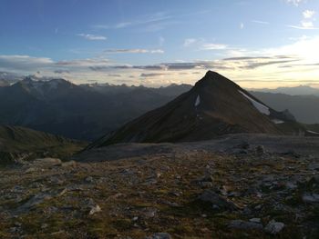 Scenic view of mountains against sky during sunset