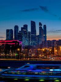 Illuminated buildings in city at night