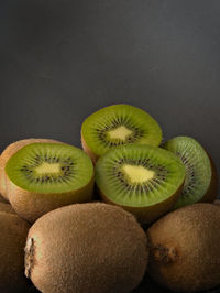 Close-up of fruits against black background