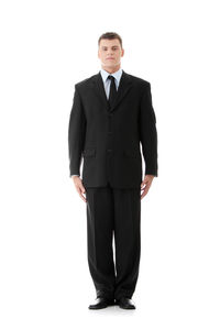 Portrait of man standing against white background