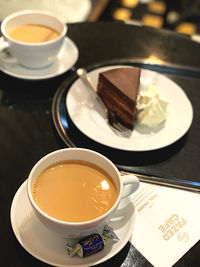 High angle view of coffee cup on table