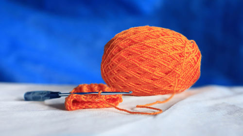 Close-up of orange slices on table
