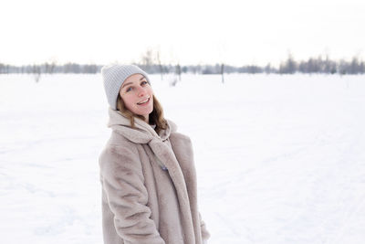 Woman standing outdoors during winter