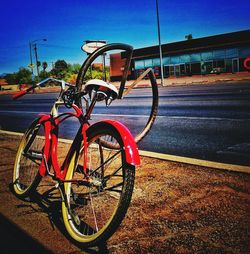 Bicycle against clear blue sky