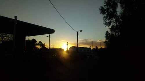 Silhouette of street at sunset