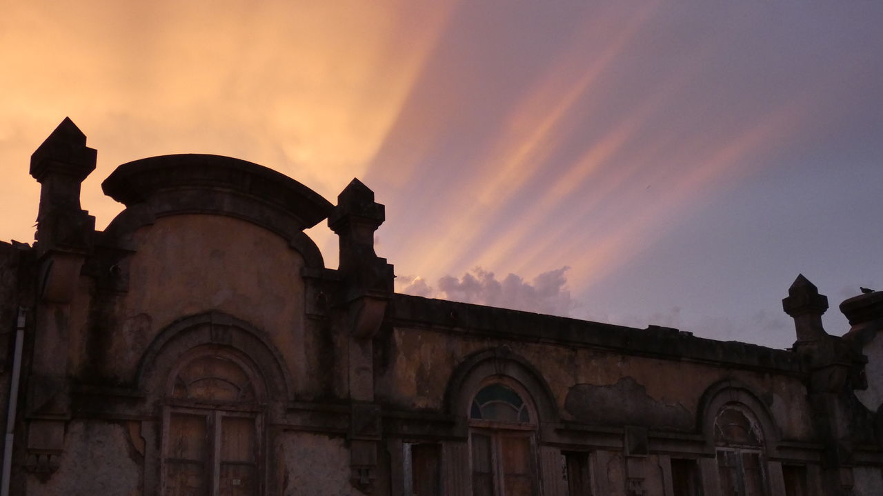 LOW ANGLE VIEW OF SILHOUETTE TEMPLE AGAINST SKY