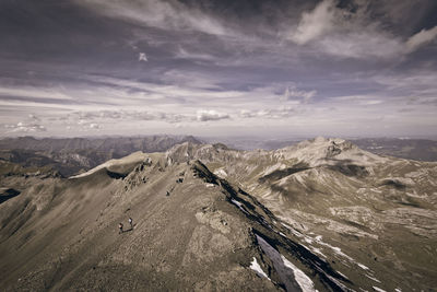 Scenic view of rocky mountains against sky