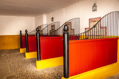 Metal railing on staircase in building