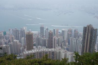 Modern buildings in city against sky