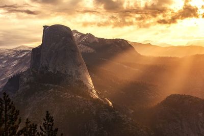 Sun beaming on mountains