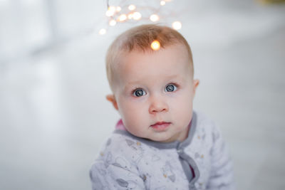 Portrait of cute baby looking at the lights