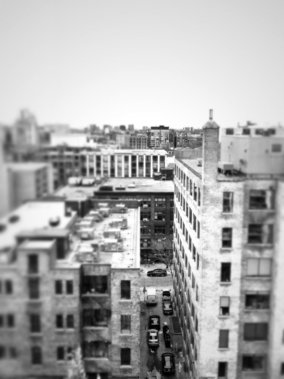building exterior, architecture, built structure, clear sky, city, cityscape, residential structure, residential building, copy space, residential district, building, water, day, high angle view, outdoors, no people, city life, house, window, sky