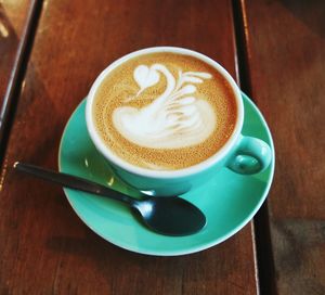 Close-up of cappuccino on table