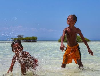 People enjoying at beach