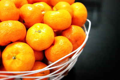 High angle view of oranges in basket