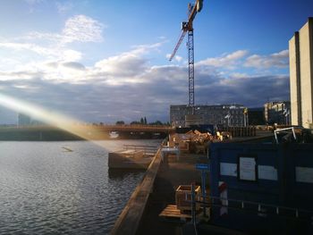 Pier over sea against sky during sunset