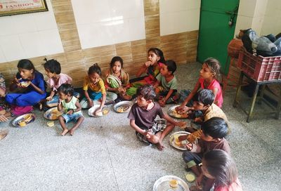 High angle view of people sitting outdoors