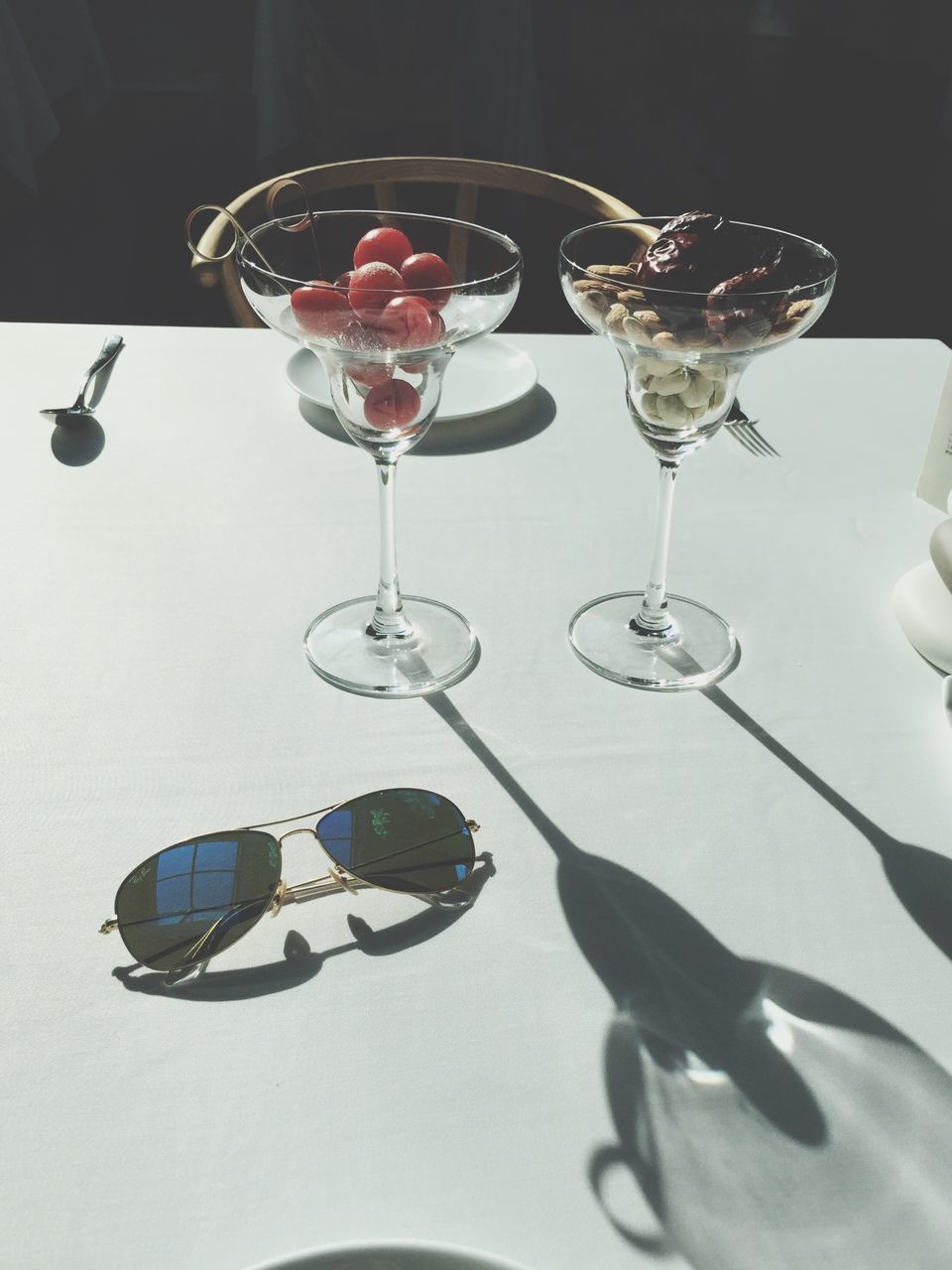 indoors, wineglass, table, glass - material, drinking glass, transparent, drink, still life, close-up, wine, glass, food and drink, refreshment, alcohol, no people, freshness, focus on foreground, fragility, restaurant, decoration