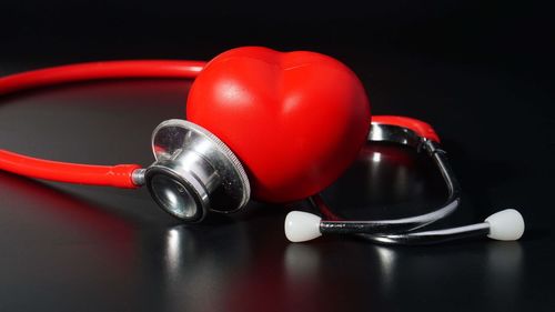 Close-up of red ball on table