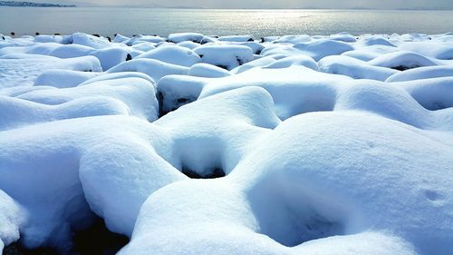 Snow on beach during winter