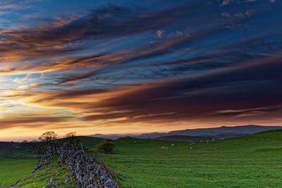 Sunset on marton scar looking north west to ingleborough and attermire scar.