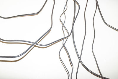 Close-up of cables against white background