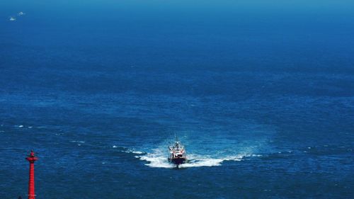 Boat sailing in sea