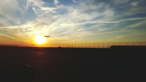 Scenic view of landscape at sunset