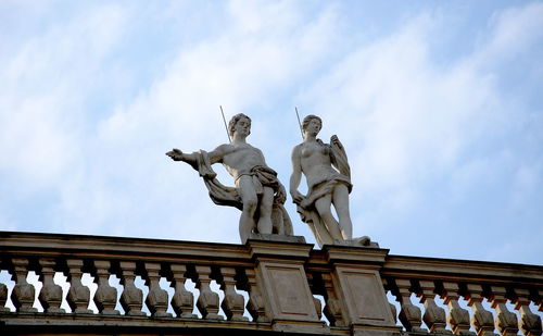 Low angle view of statue against sky