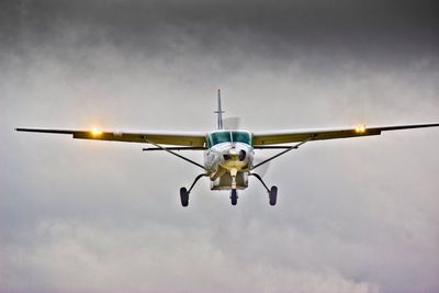 Low angle view of airplane against sky