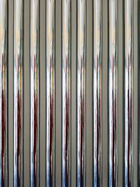 Full frame shot of shiny metal rods