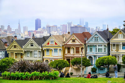 Buildings in city against sky