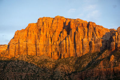 Rock formations on mountain against sky