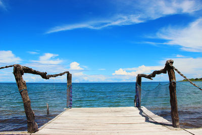 Scenic view of sea against blue sky