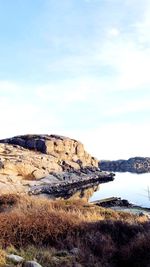 Rocks on land against sky