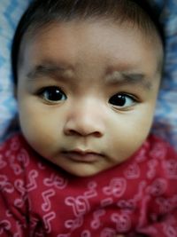 Close-up portrait of cute baby girl