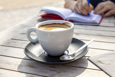 Close-up of coffee cup on table