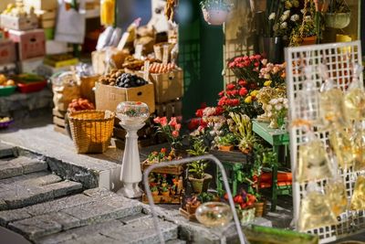 Food and flowers for sale at market