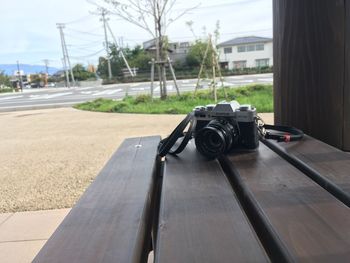 Close-up of camera against road