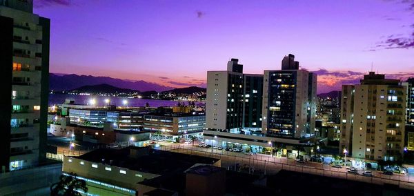 High angle view of illuminated buildings at night