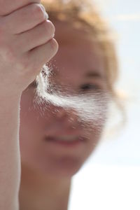 Close-up of woman hand holding water